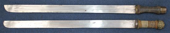 A Tibetan Dao or sword, largest 32.5in. incl. scabbard
